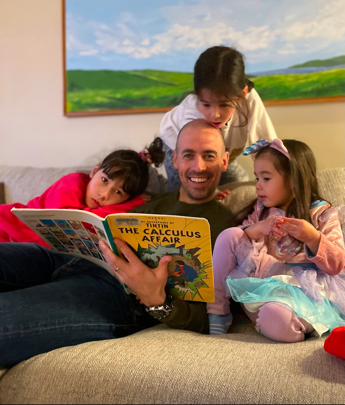 David reading Tintin with his kids