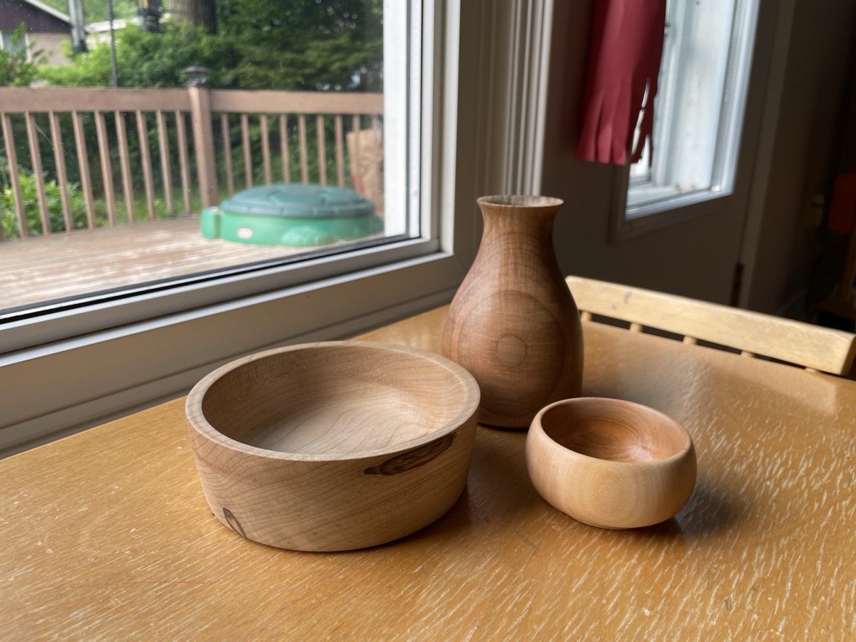 Bowls and vase by the window