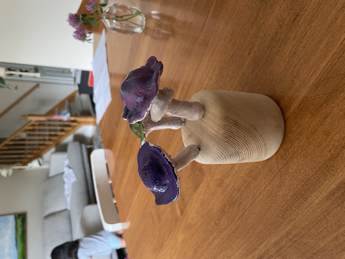 Turned vase with mushroom sculptures